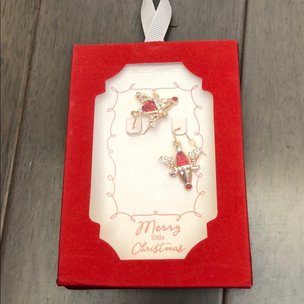 Cute reindeer earrings. New in Box.